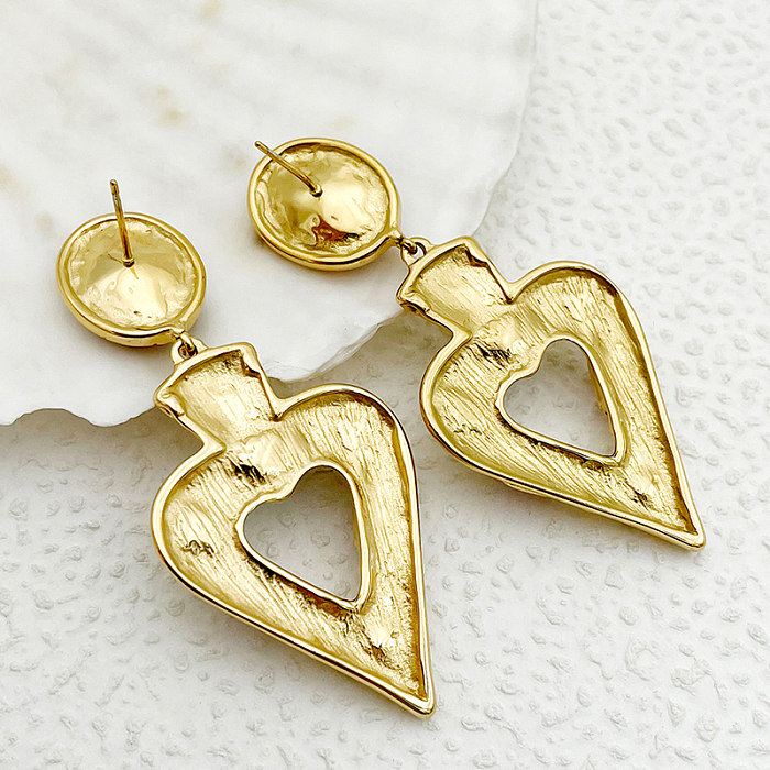 1 par de elegantes pendientes colgantes chapados en oro con incrustaciones de acero inoxidable y forma de corazón de estilo vintage