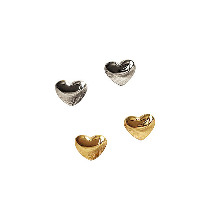 1 par de brincos de orelha em formato de coração de estilo simples em aço inoxidável