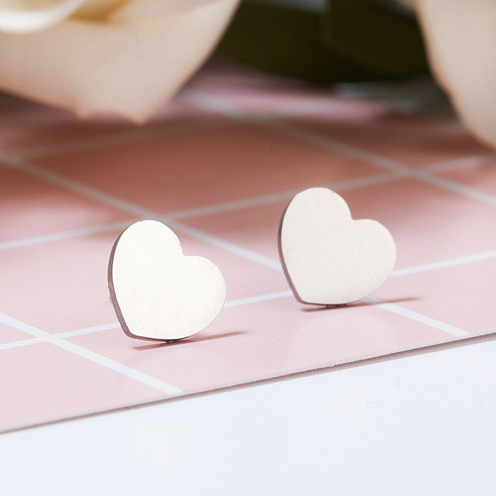 Boucles d'oreilles simples en acier inoxydable en forme de cœur, vente en gros