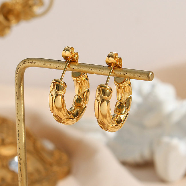 Damen-Ohrringe aus Edelstahl mit Schlangenleder-Beschichtung