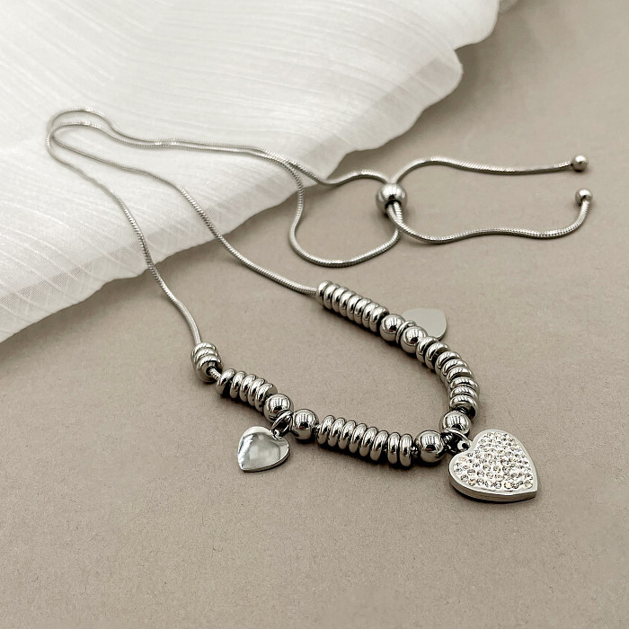 Hip-hop estilo moderno formato de coração em aço inoxidável polimento incrustado colar com pingente de strass