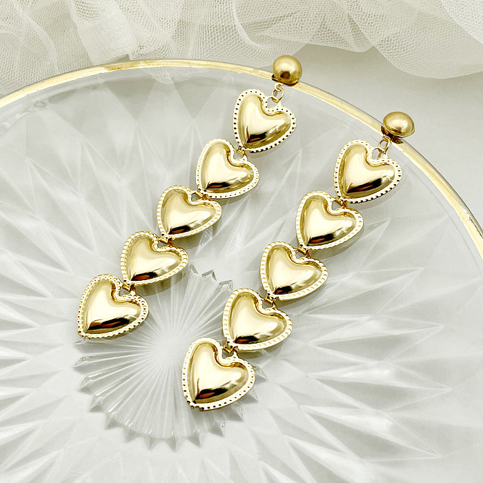 1 par de brincos de gota banhados a ouro em formato de coração exagerado em aço inoxidável