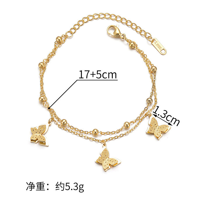 Elegante estilo simples borboleta comutar pulseiras banhadas a ouro 14K em aço inoxidável