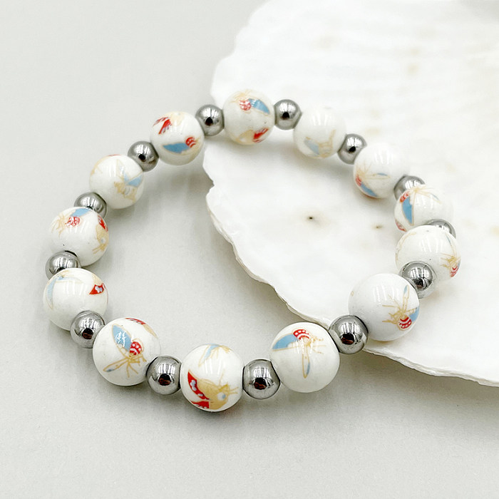 Großhandel mit eleganten runden Edelstahl-Perlenarmbändern im Vintage-Stil