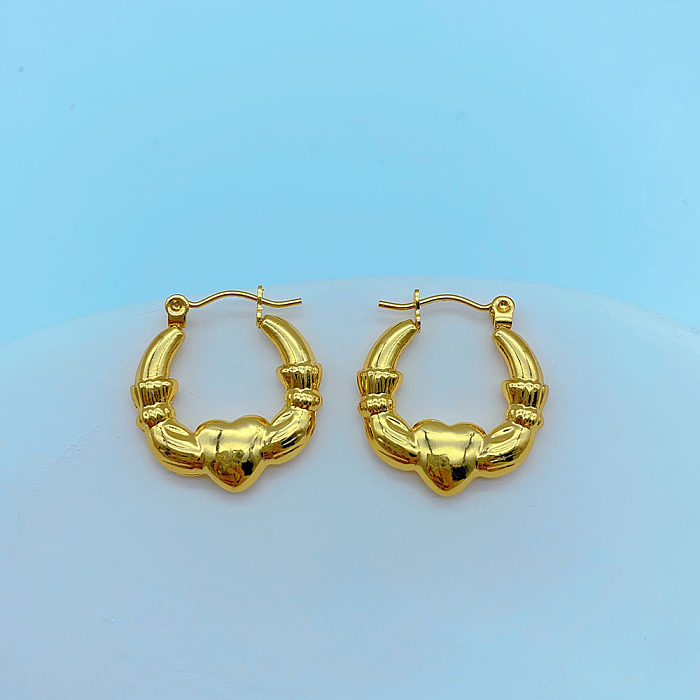 1 paire de boucles d'oreilles plaquées en acier inoxydable en forme de cœur de style moderne