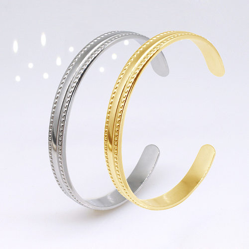 1 bracelet tendance en acier titane de couleur unie.