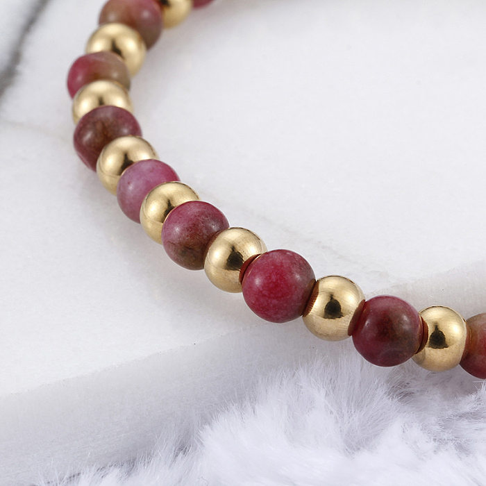 Japanische und koreanische Mode, einfaches, künstliches Granat-Perlen-Titanstahl-Unisex-einziehbares Nischen-Goldarmband