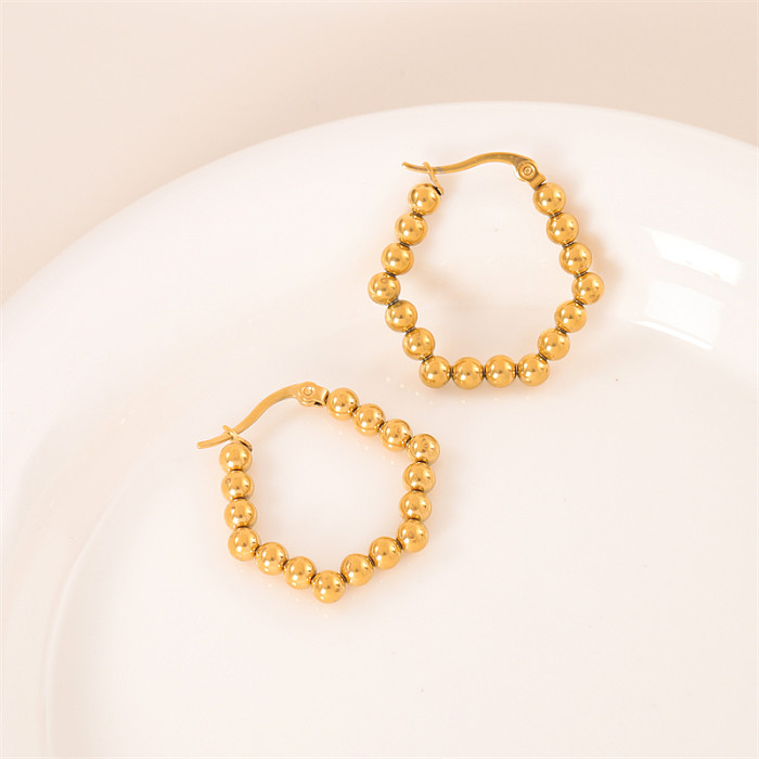 1 Paar schlichte, unregelmäßige runde Edelstahl-Ohrringe mit 18-Karat-Vergoldung