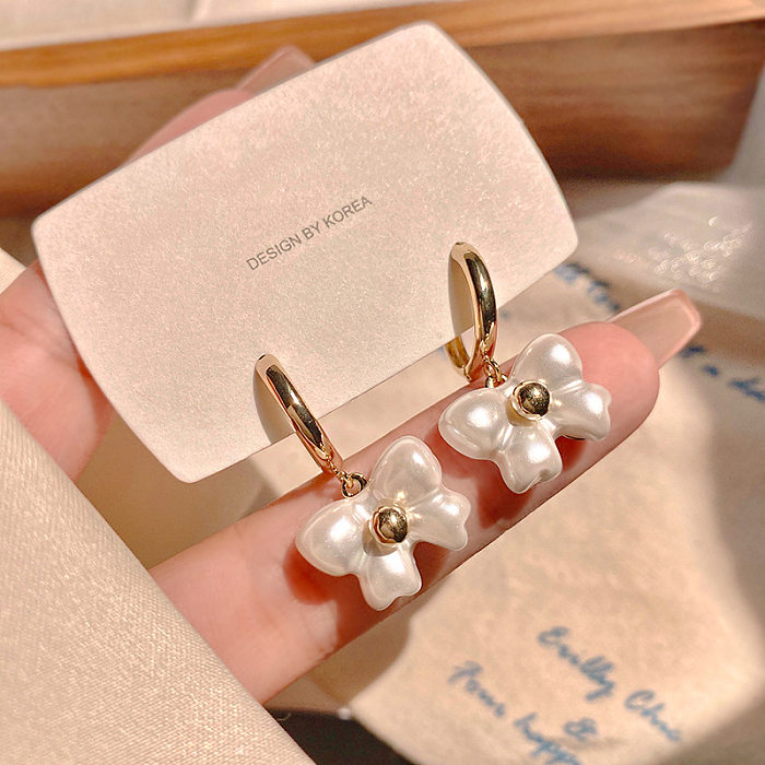 1 Paar künstlerische Pendler-Ohrringe aus Edelstahl mit Schleife im koreanischen Stil
