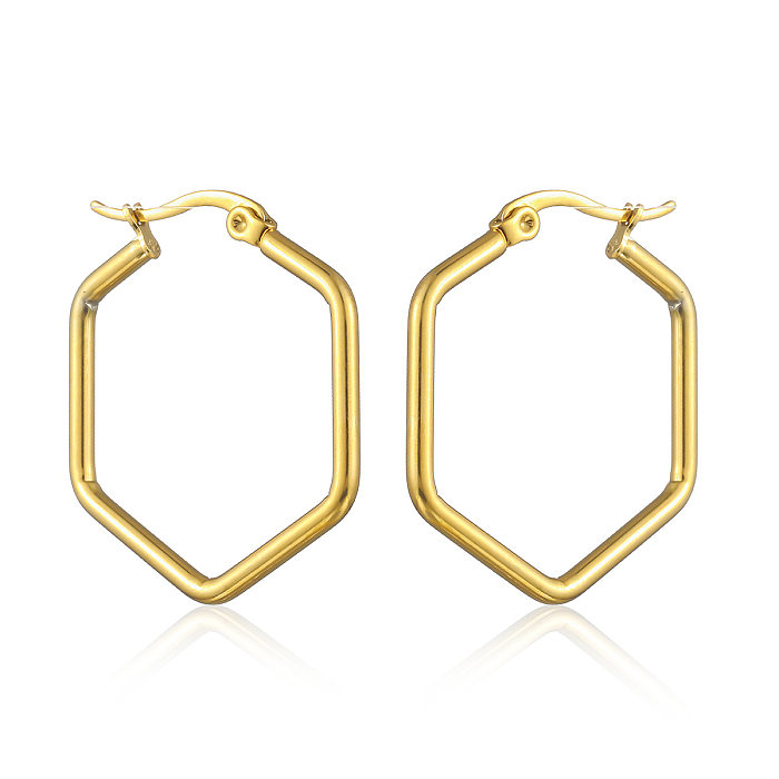 1 par de pendientes chapados en oro de acero inoxidable con forma de corazón de estilo simple