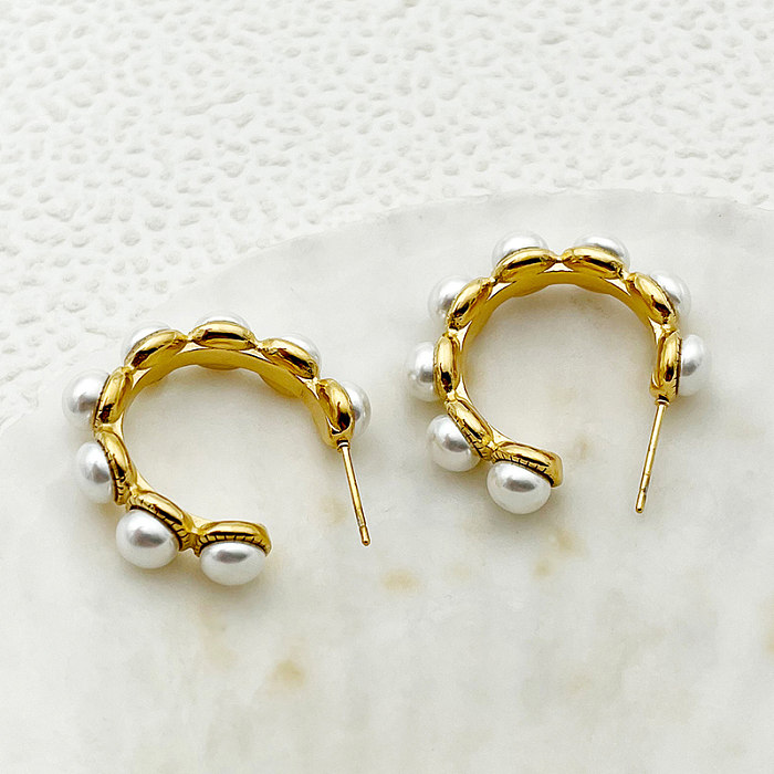 1 par de pendientes chapados en oro con perlas artificiales de acero inoxidable con incrustaciones en forma de C dulce y elegante