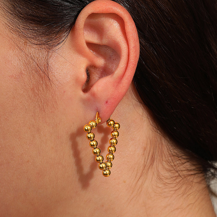 1 paire de boucles d'oreilles géométriques de vacances plaquées en acier inoxydable