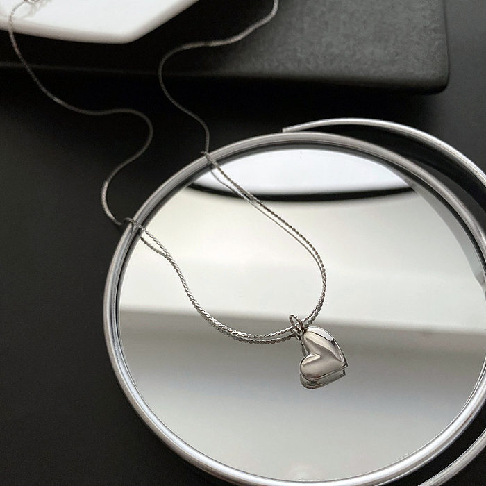 Collier de placage en acier inoxydable en forme de coeur de style simple
