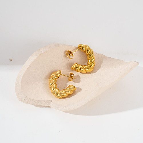 1 Paar vergoldete Commute-Ohrringe aus Edelstahl in C-Form