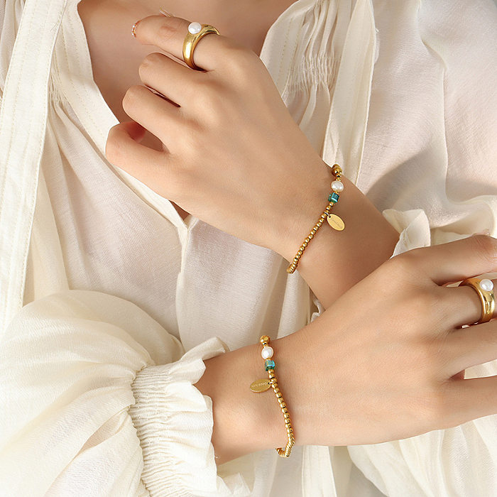 Bracelets en acier au titane de couleur unie décontractés Bracelets en acier inoxydable avec perle de cristal perlé