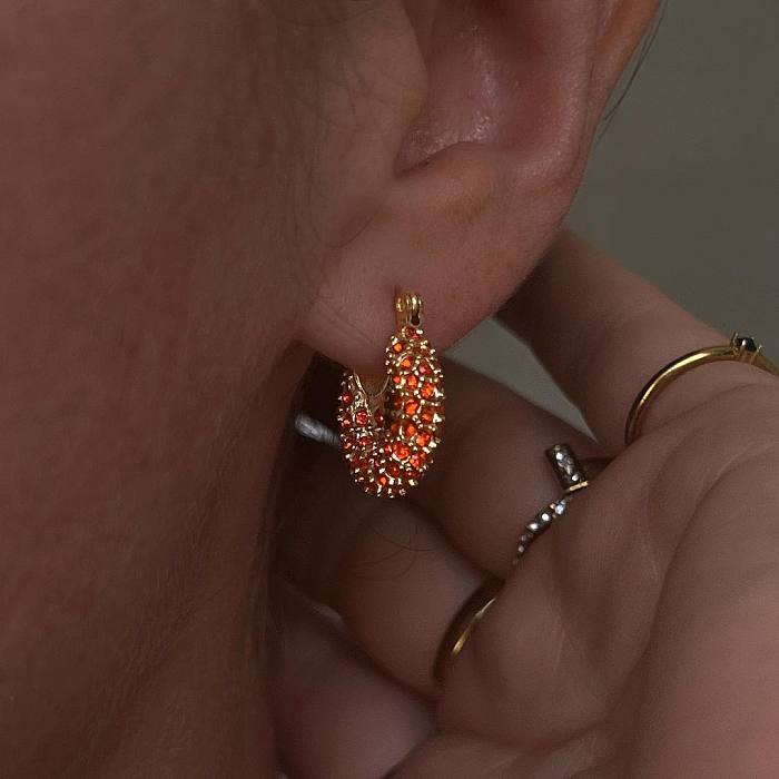 1 paire de boucles d'oreilles plaquées or 18 carats en forme de U de style moderne avec incrustation de zircone en acier inoxydable
