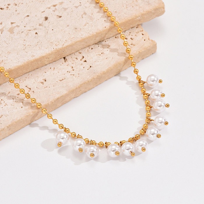 Elegante, runde Anhänger-Halskette aus Edelstahl mit künstlicher Perlenbeschichtung und 14-Karat-Vergoldung