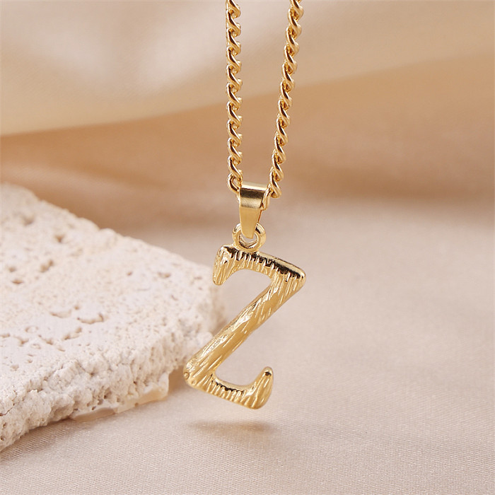 قلادة على شكل حرف فني من الفولاذ المقاوم للصدأ مطلية بالذهب عيار 18 قيراط، بتصميم بسيط ورائع