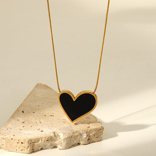 Collier pendentif vintage noir irrégulier en forme de cœur en acier inoxydable