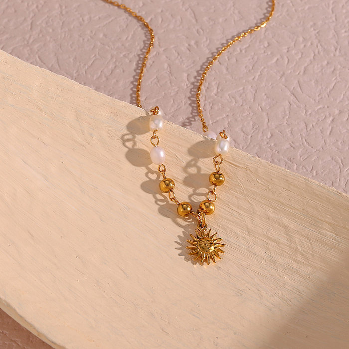 Halskette mit Perlenanhänger im Retro-Stil mit Sonnen-Edelstahlbeschichtung