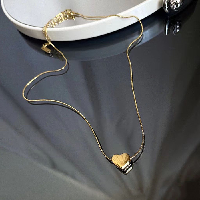 Lässige, schlichte Halskette in Herzform mit Edelstahlbeschichtung und 18-Karat-Vergoldung