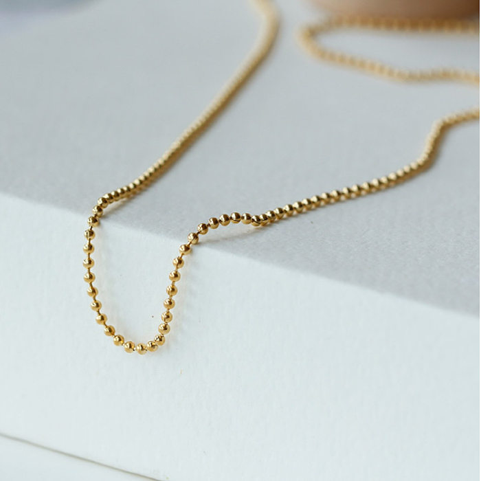 Einfache geometrische Halskette aus Edelstahl mit Perlen und Perlen aus Edelstahl