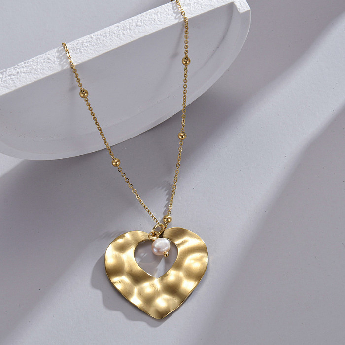 قلادة على شكل قلب من الفولاذ المقاوم للصدأ مطلية بالذهب عيار 14 قيراط بتصميم بسيط بكميات كبيرة