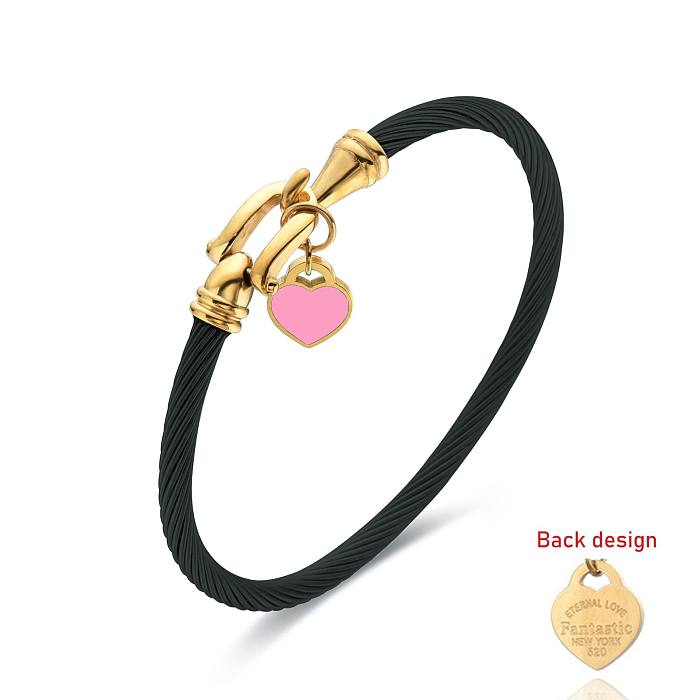 Brazalete chapado en oro de acero inoxidable con forma de corazón de estilo simple