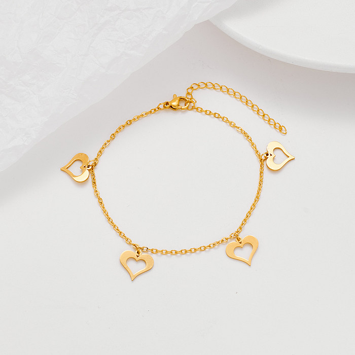 Bracelets en acier titane plaqué or, Style français, imprimé patte d'arbre, en forme de cœur, vente en gros