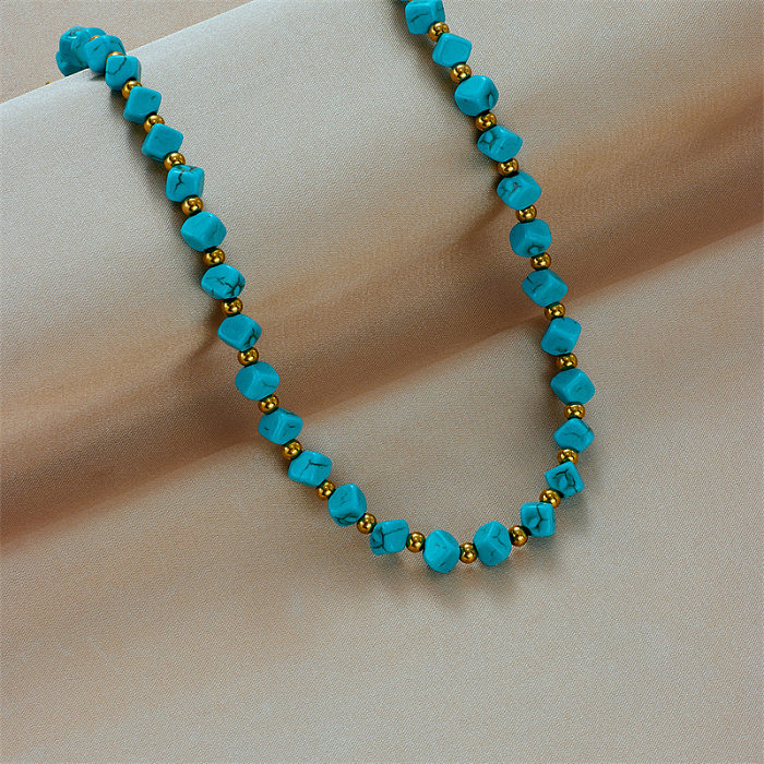 Quadratische Halskette aus Edelstahl mit Perlenbeschichtung im Ethno-Stil