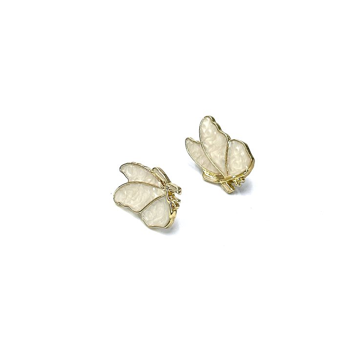 1 paire de clous d'oreilles papillon en acier inoxydable, style simple