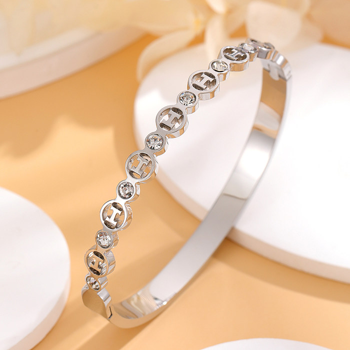 Bracelet plaqué or 18 carats avec incrustation de strass en acier titane avec lettre de style simple et élégant