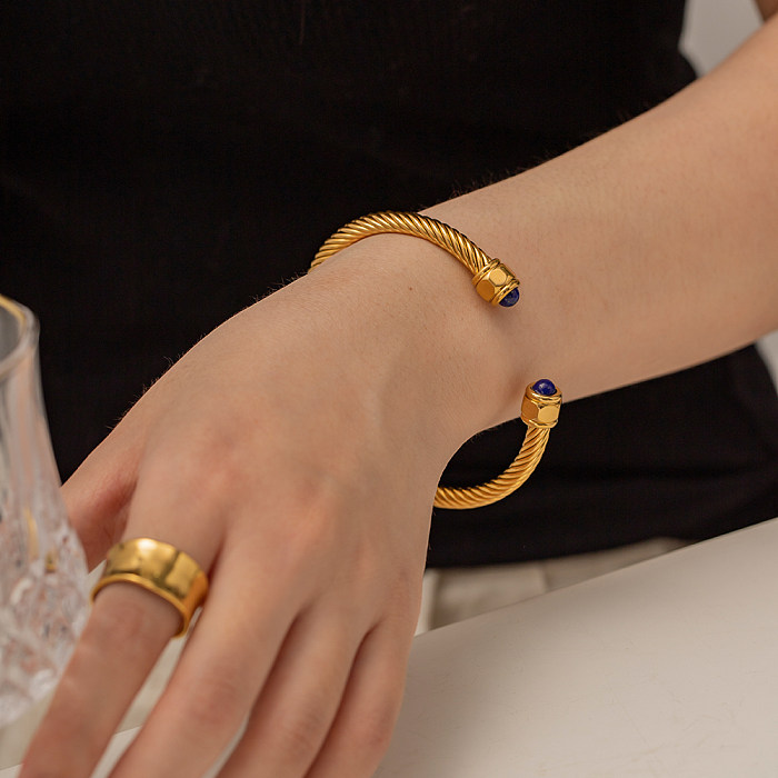 Bracelet plaqué or 18 carats avec incrustation de placage en acier inoxydable en forme de C de style simple de style IG