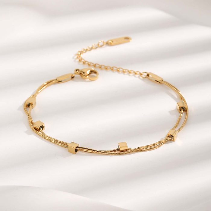 Elegante, niedliche, schlichte, einfarbige Armbänder aus Titanstahl mit Perlenbeschichtung und vergoldeter Oberfläche