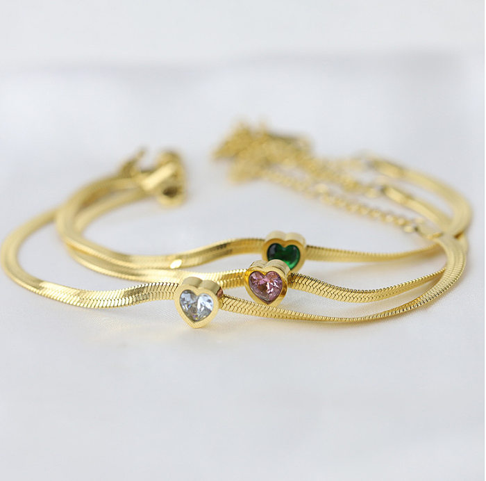 Herzförmige Armbänder im französischen Stil mit Titanstahleinlage und eingelegtem Goldzirkon
