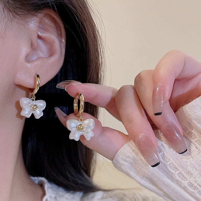 1 paire de boucles d'oreilles en acier inoxydable avec nœud papillon de Style coréen pour trajet artistique
