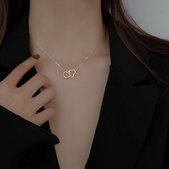 Collier plaqué or 18K de placage d'acier inoxydable de forme de coeur de style simple