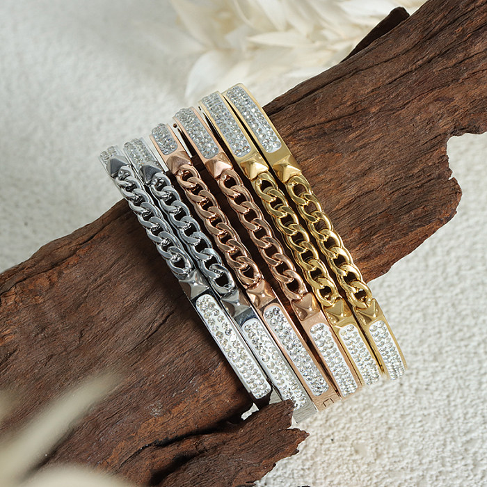Bracelet plaqué or 18 carats avec incrustation de strass en acier titane de couleur unie élégante