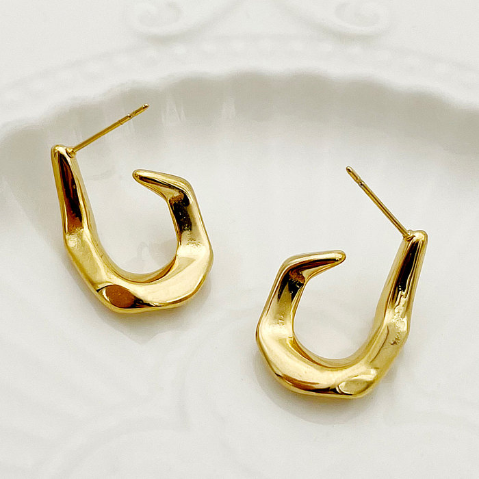1 paire de clous d'oreilles en acier inoxydable plaqué or, style romain, couleur unie