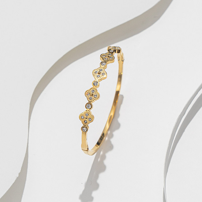Elegante brilhante trevo de quatro folhas aço inoxidável titânio aço 18K pulseira de zircão banhado a ouro a granel