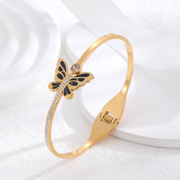 Atacado retrô olho do diabo flor borboleta titânio aço 24K pulseira de zircão banhado a ouro