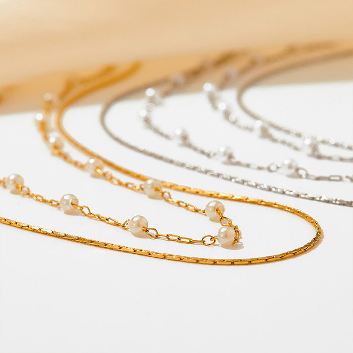 Colliers superposés de perles artificielles de placage d'acier inoxydable géométrique élégant