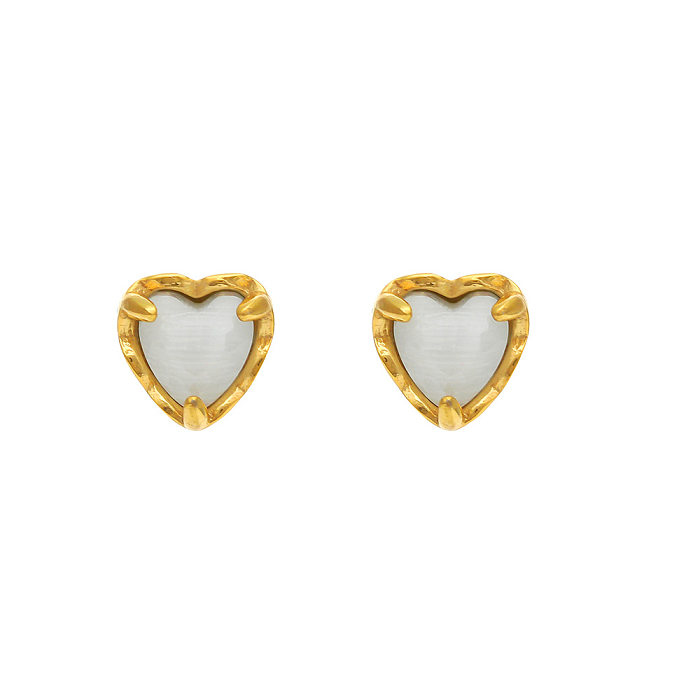 Pendientes de tuerca de acero inoxidable con circonita en forma de corazón chapados en oro de 18 quilates para mujer simples a la moda