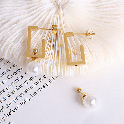 Pendientes de perlas de imitación de oro de 18k chapados en acero inoxidable con personalidad Simple para mujer al por mayor