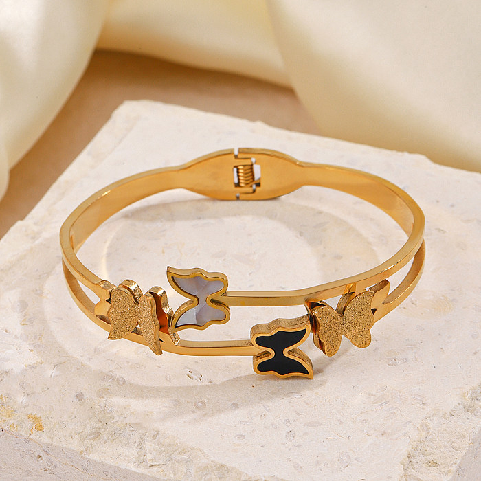 Bracelet plaqué or 18 carats en acier inoxydable papillon de style IG