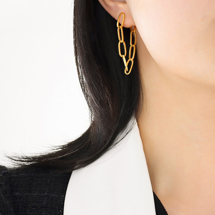 1 paire de boucles d'oreilles géométriques élégantes, couleur unie, plaquées en acier inoxydable