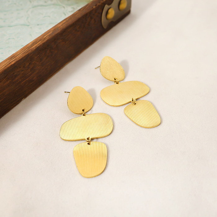 1 par de pendientes colgantes chapados en oro de 14 quilates con revestimiento de acero inoxidable geométrico de estilo simple