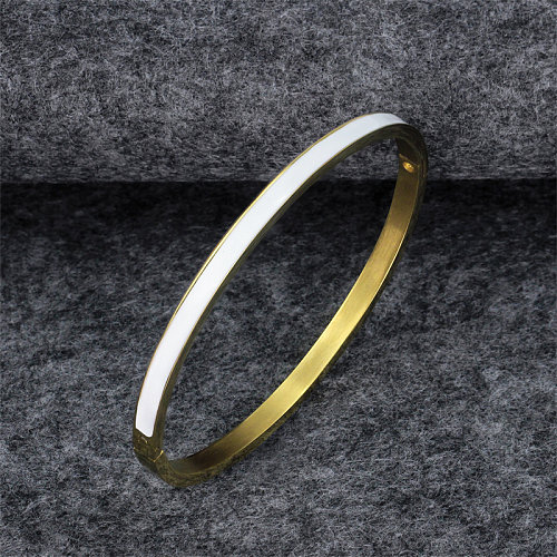 Bracelet plaqué or époxy en acier titane avec bloc de couleur de style simple