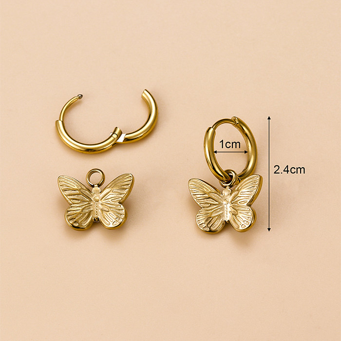 Fashion Cross Devil'S Eye Heart Shape Stainless Steel  Butterfly Gold Plated Artificial Pearls Rhinestones Dangling Earrings 1 Pair
