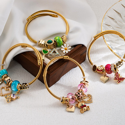 Bracelet plaqué or 14 carats en alliage d'acier inoxydable avec papillon en forme de cœur en forme d'ours doux de style IG